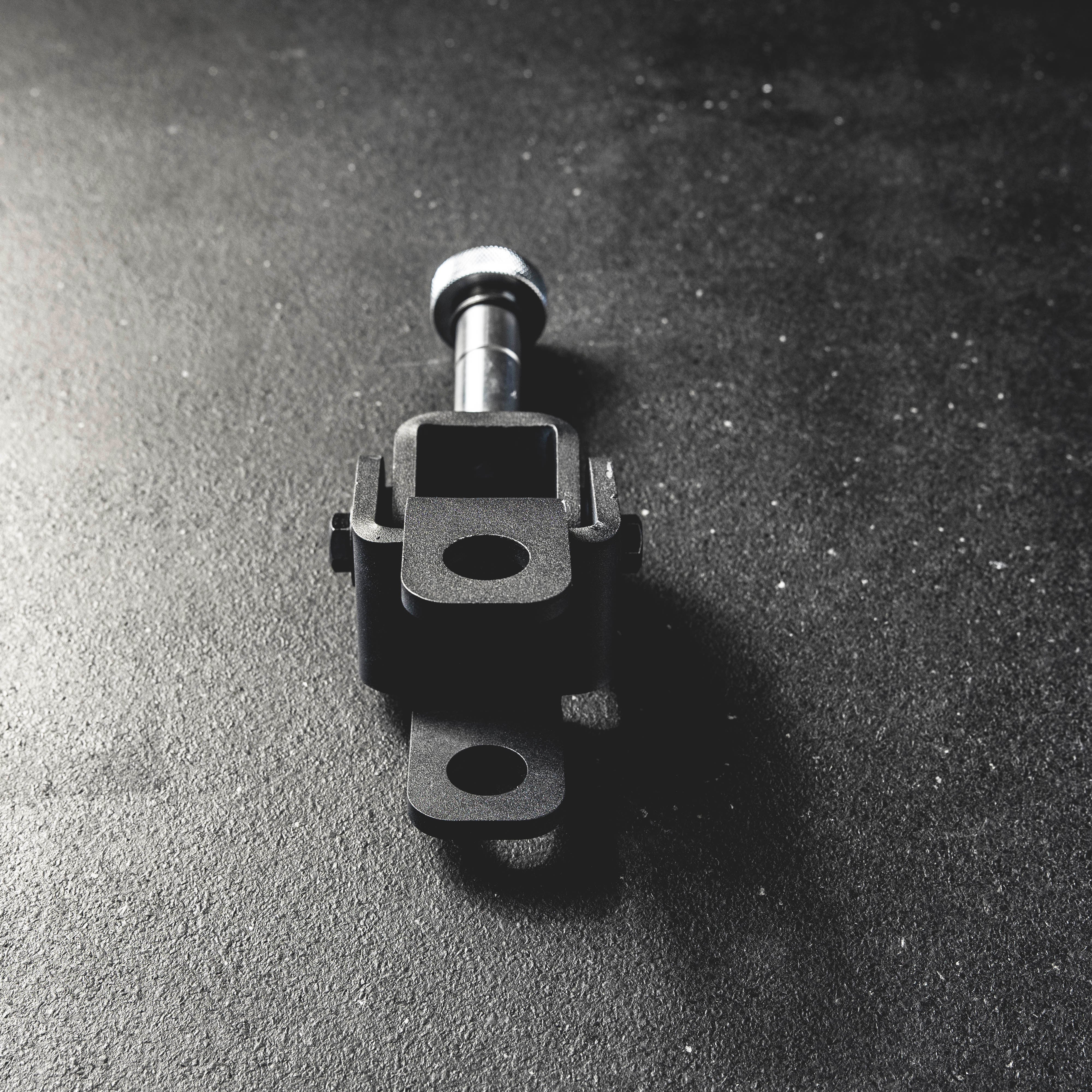 Mechanical component on a dark textured surface