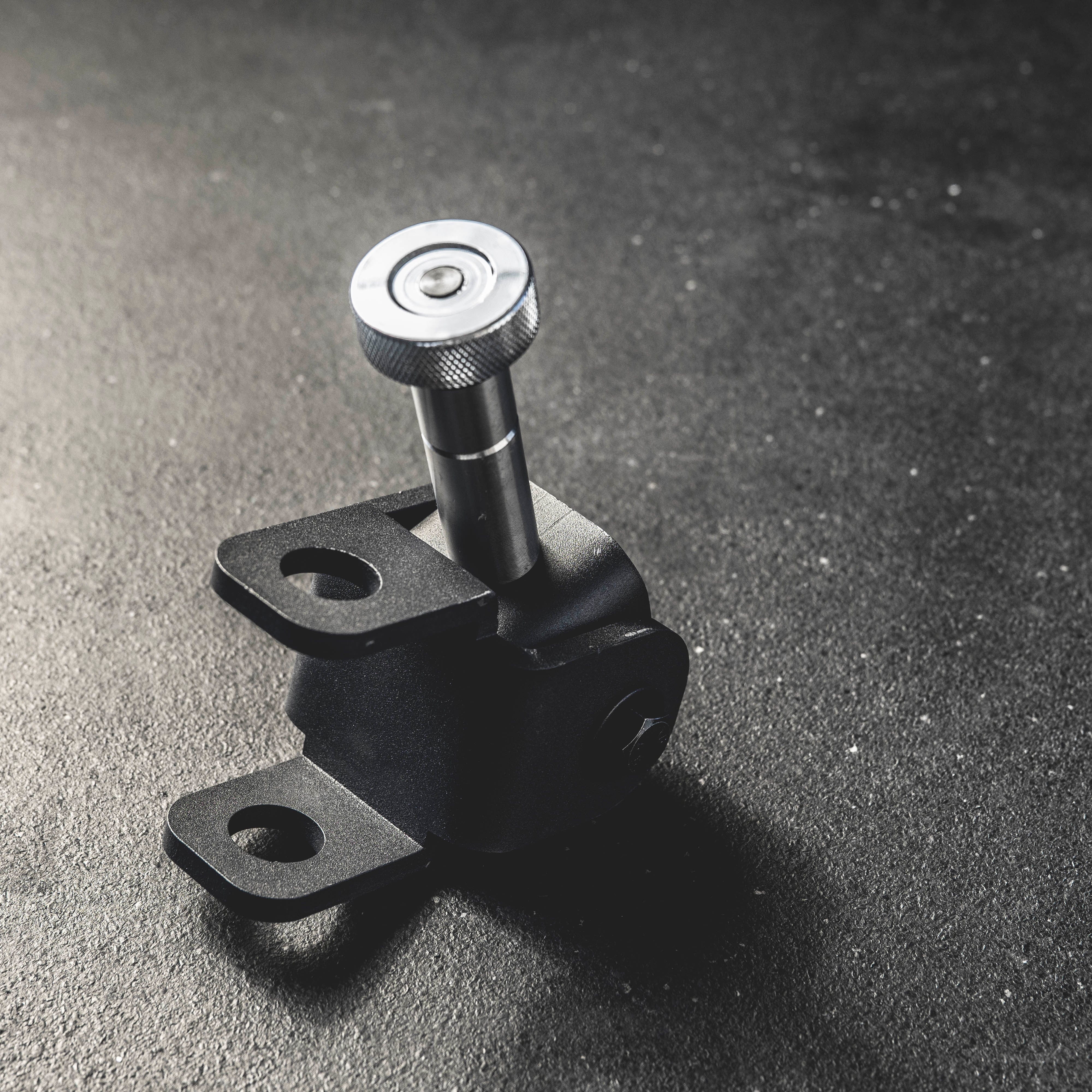 Metal bracket on a dark textured surface
