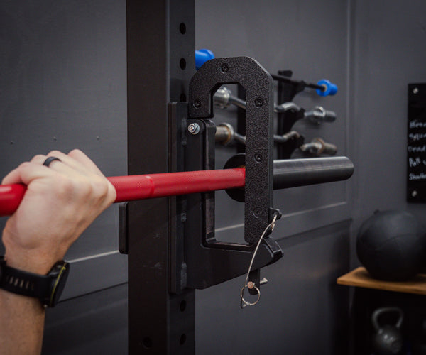 Using the Calf Cup Set for performing standing full-range-of-motion calf raises without scratching your barbell or squat rack