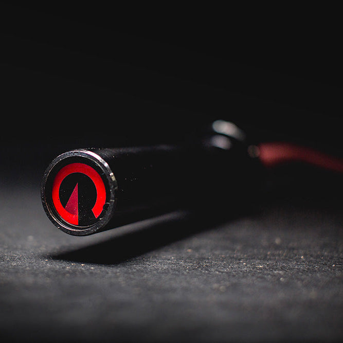 The Edge Bar is a mix between a shortened cambered bar and an EZ Bar. Perfect for enhanced bicep workouts, chest workouts, and more. This image presents a close up of weight mounting area of the Edge Rackable Cambered Bar.