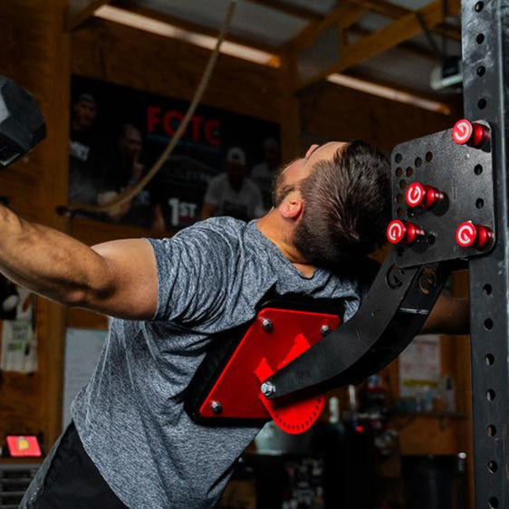 The rack-attaching, Infinity Arm can be utilized for chest-supported, arm-supported, back-supported, head-supported, and many other supported exercises. This image presents the Infinity Arm being used for chest exercises in a home gym.