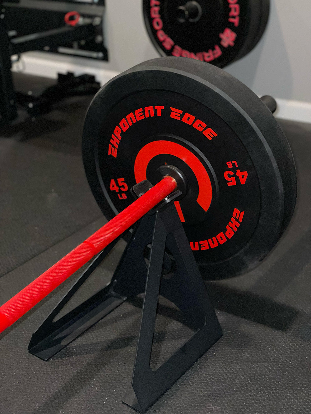 The Infinity Bar is a hybrid Bodybuilding and Powerlifting barbell. This images presents the Infinity Bar on a landmine workout stand.