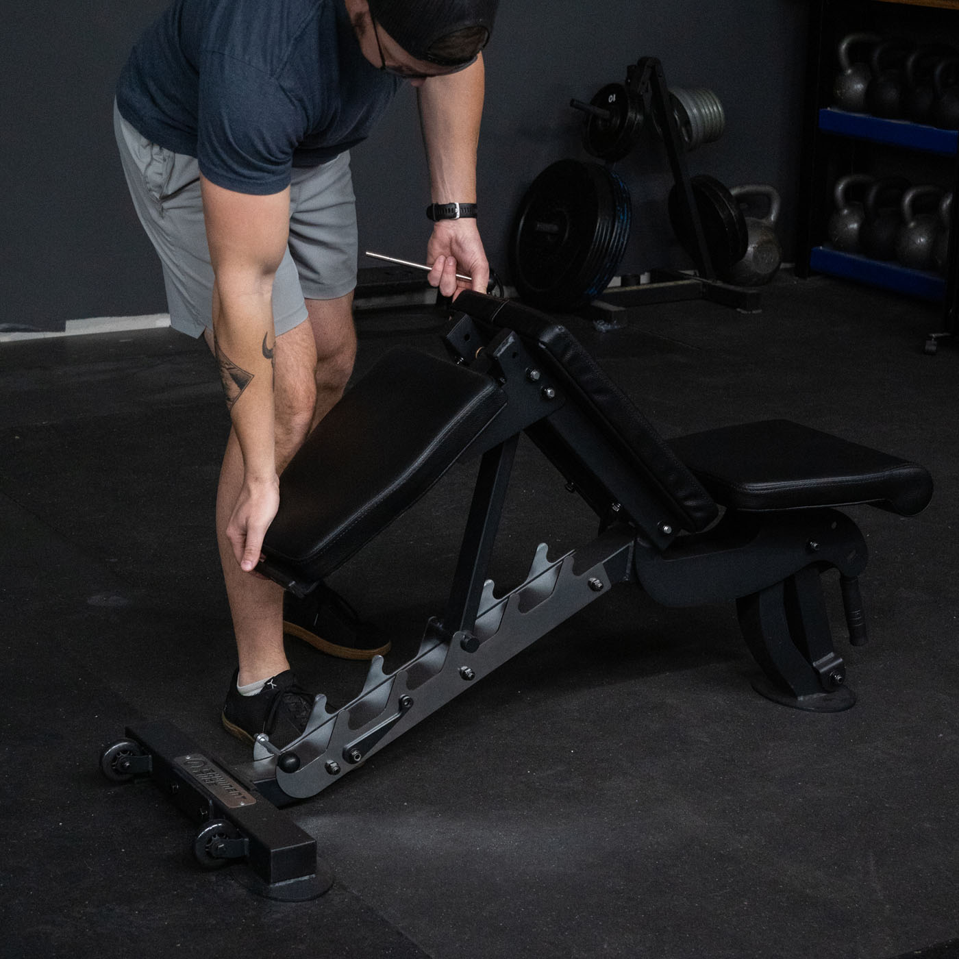 Infinity bench adjusted to a half bench for overhead weight lifting and chest and back supported exercises