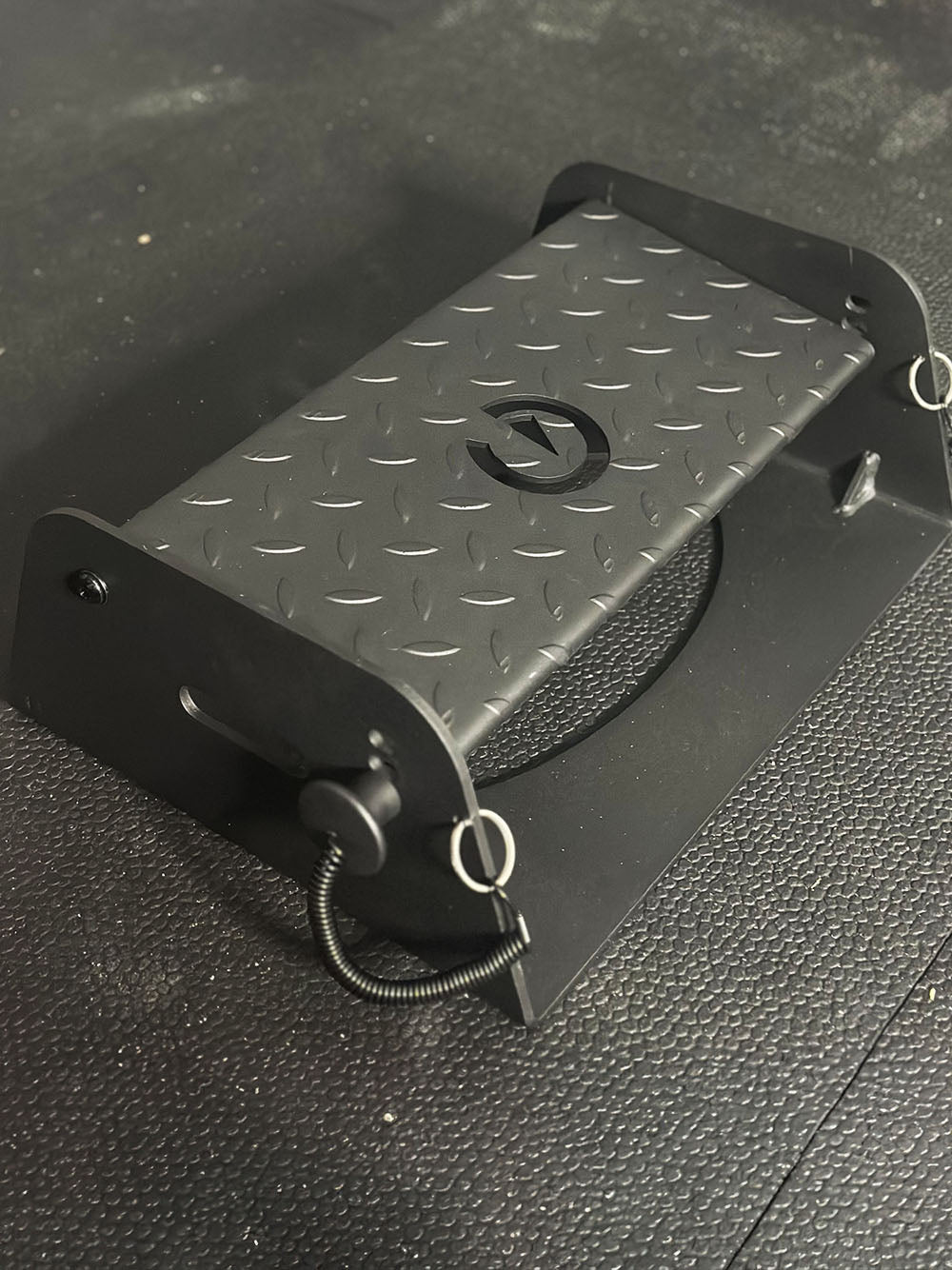 The Flex Wedge is an adjustable calf raise block used for calf workouts. This image presents the Flex Wedge from a top angle.