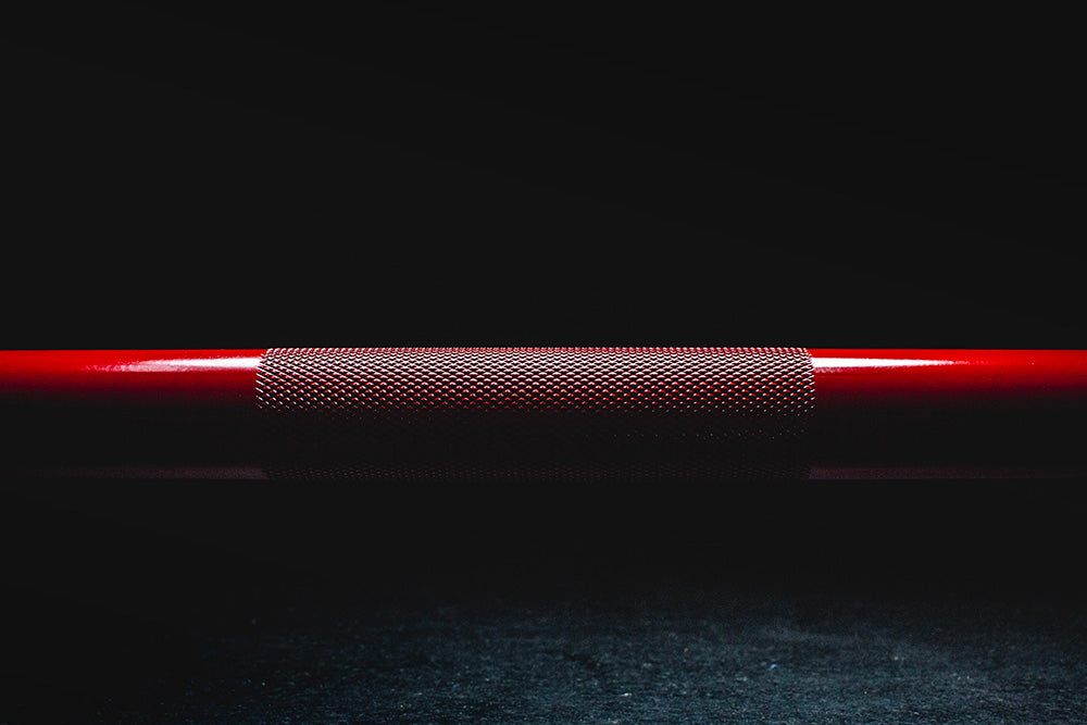 The Infinity Bar is a hybrid Bodybuilding and Powerlifting barbell. This images presents a close-up view of the center grip oft he Infinity Bar.
