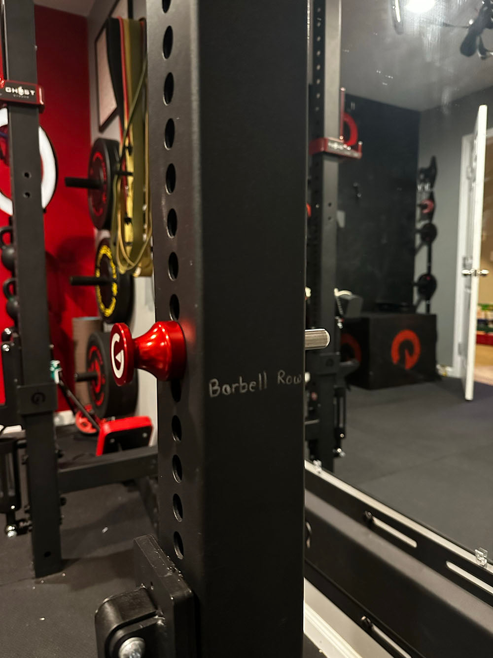 Custom Exponent Edge Magnetic pins fit all major brands of squat racks, power racks, and accessories, including Exponent Edge workout equipment. This image presents the Magnetic Edge Pins on a rack from a side view.
