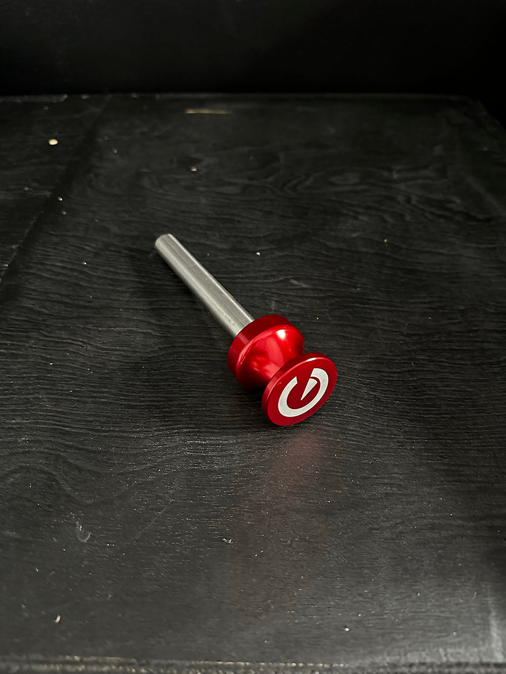 Custom Exponent Edge Magnetic pins fit all major brands of squat racks, power racks, and accessories, including Exponent Edge workout equipment. This image presents the Magnetic Edge Pin from angled, side view.
