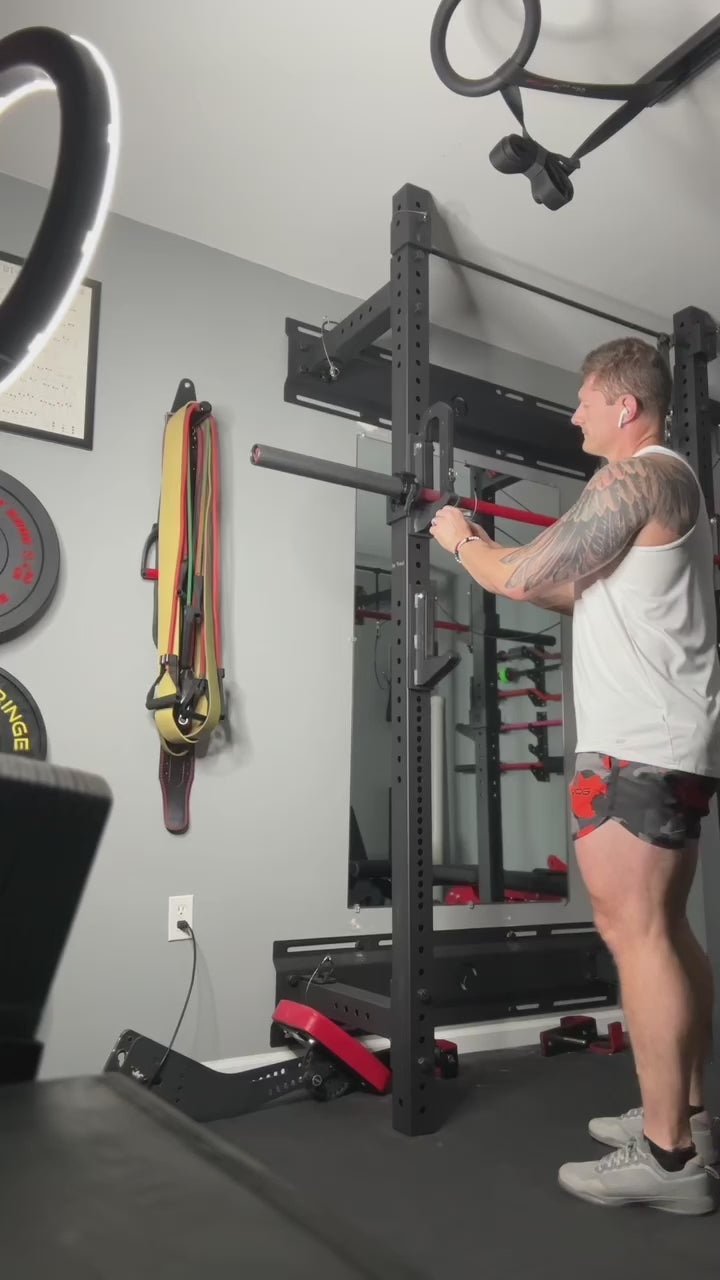 Demonstration of Calf Cup Set of adding the calf cups showing how to convert a power rack into a mini Smith machine for calf raises